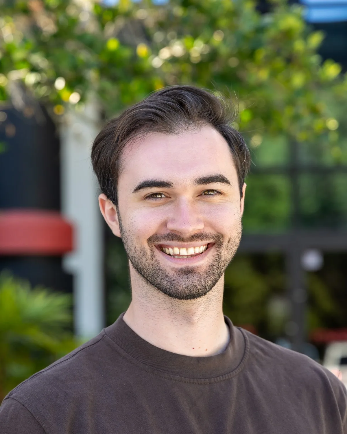 Christian Webster, smiling, outdoors in Tampa